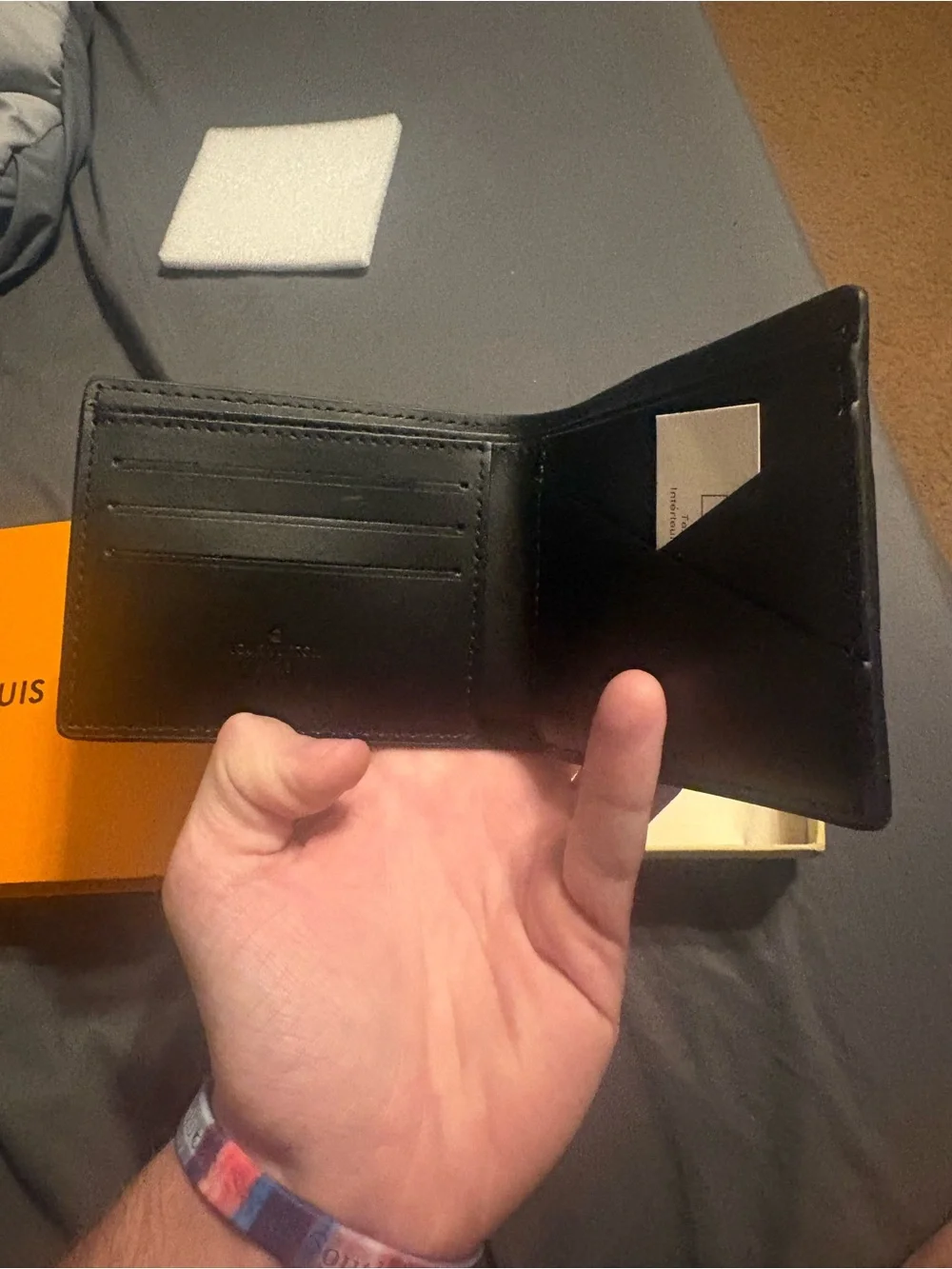 Louis Vuitton Black Embossed Monogram Bi-Fold Card Holder